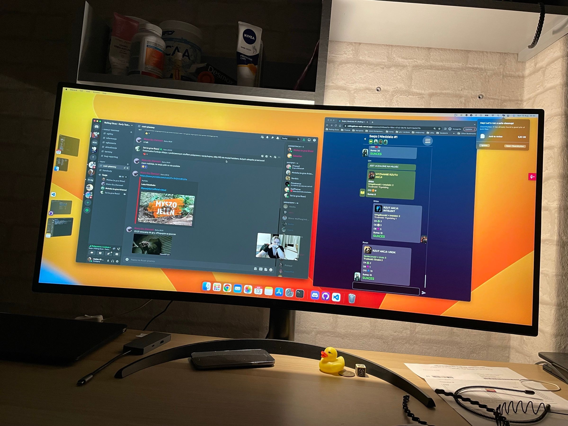 An ultrawide monitor showing a Discord voice call and the Rolling Dices session view with action rolls side by side.